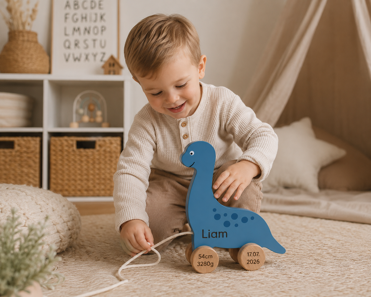 Nachziehspielzeug Dino aus Holz mit individueller Namensgravur