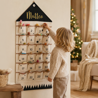 Kind befüllt personalisierten Adventskalender mit Name Matteo